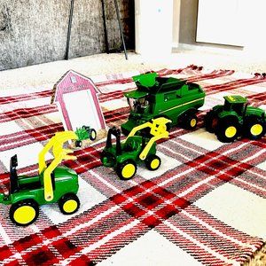 Take yourself back in time of with our collection of John Deere tractor toys